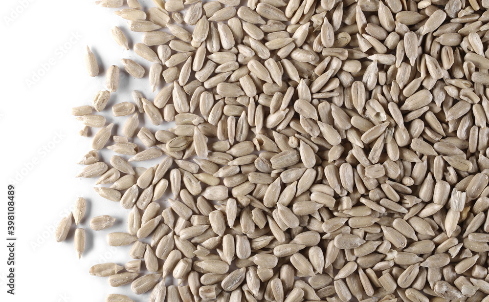 Peeled sunflower seeds isolated on white background and texture, top view Peeled sunflower seeds isolated on white background and texture, top view