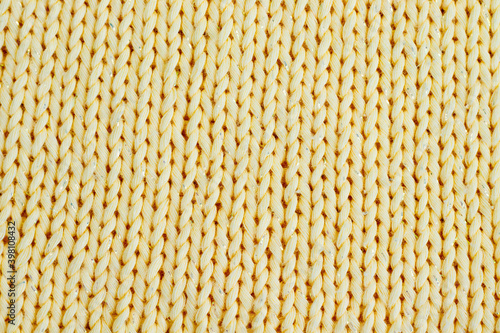 knitted background knitting hobby yellow beautiful color with space for text macro