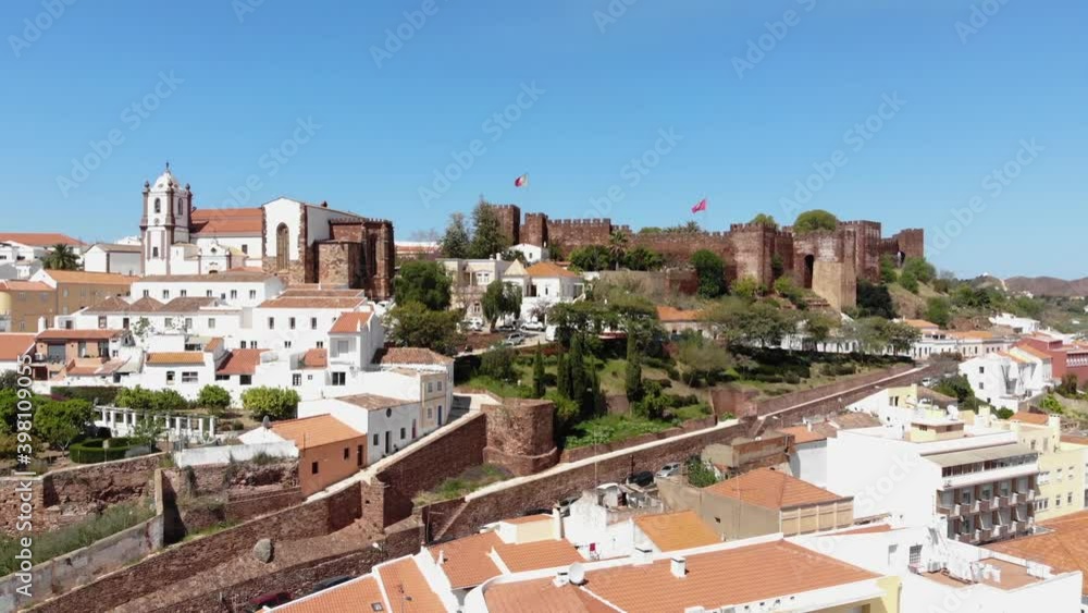 Scenic aerial view of fortified and walled city and Castle of Silves, Algarve, Portugal Scenic aerial view of fortified and walled city and Castle of Silves, Algarve, Portugal