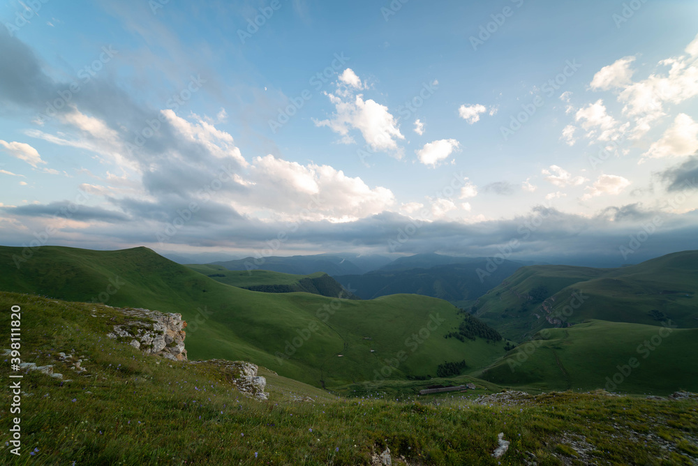 Fototapeta premium Beautiful clouds in the mountains dawn