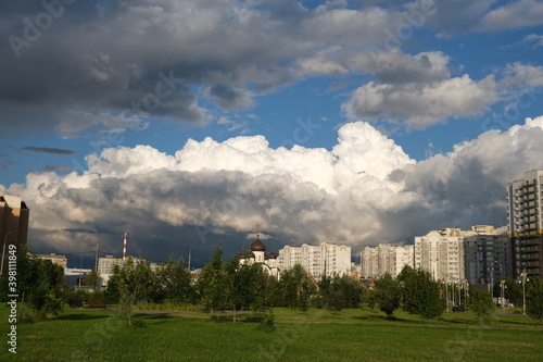 Dark rain clouds against the background of the Moscow sleeping area. 