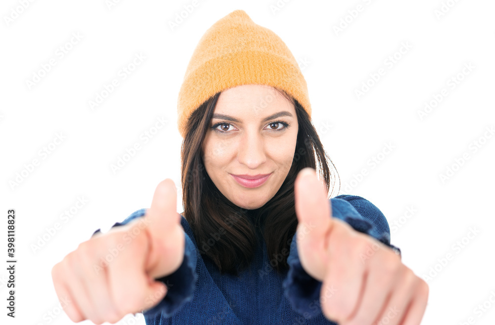 Young girl with thumbs up, like concept. Focus on face. Isolated on white background. Yes gesturing, sings of good work Young girl with thumbs up, like concept. Focus on face. Isolated on white background. Yes gesturing, sings of good work