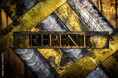 Repent text on grunge silver with textured copper and gold background