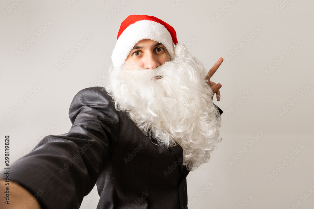 Taking holly jolly x mas festive memories. Funny Saint Nicholas photographer makes shot on camera, isolated on white background Taking holly jolly x mas festive memories. Funny Saint Nicholas photographer makes shot on camera, isolated on white background