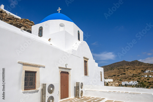Church of Virgin Mary of the Cliff. Traditional Greek church with blue dome in Chora town on Ios Island. Cyclades, Greece
