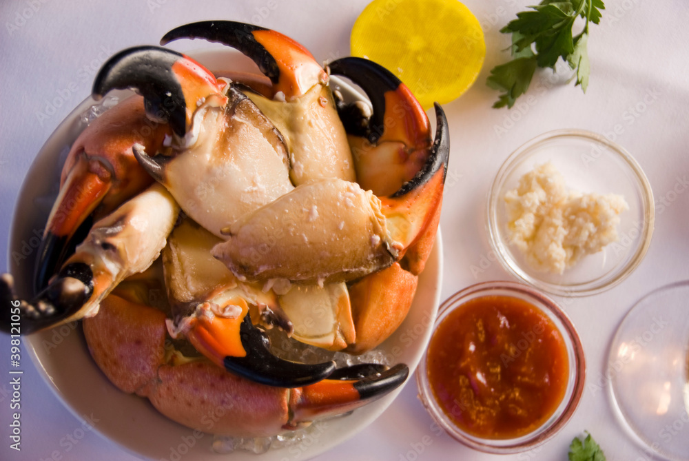 Stone crab claws. Colossal Crab claws served with lemons, spicy