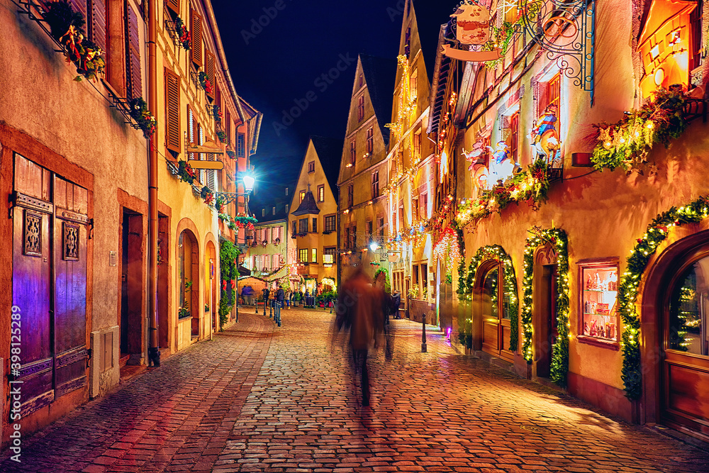 cozy street of Kaysersberg old village on Christmas holidays. Alsace, France