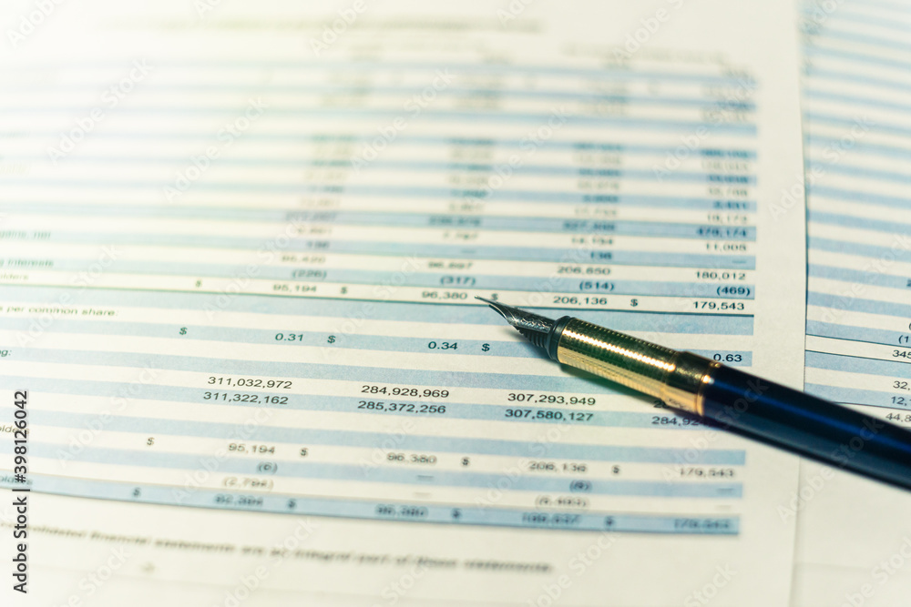 Balance accounting sheet in stockholder report book, balance sheet. Selective focus Balance accounting sheet in stockholder report book, balance sheet. Selective focus