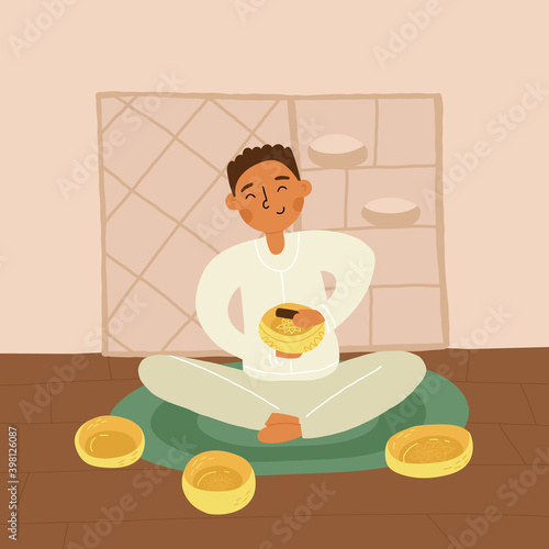 An Asian boy or young man do singing bowls healing therapy sitting on the mat, a lot of metallic bowls nearby.