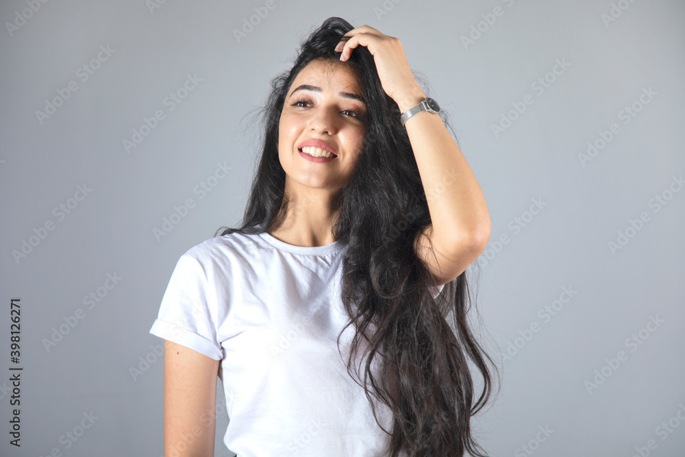 Fototapeta premium happy woman hand in hair