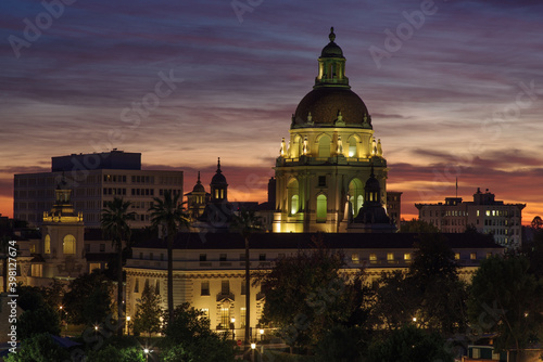 Image showing the Pasadena City Hall in the foreground photographed during the civil twilight. Pasadena is located in Los Angeles County, California.