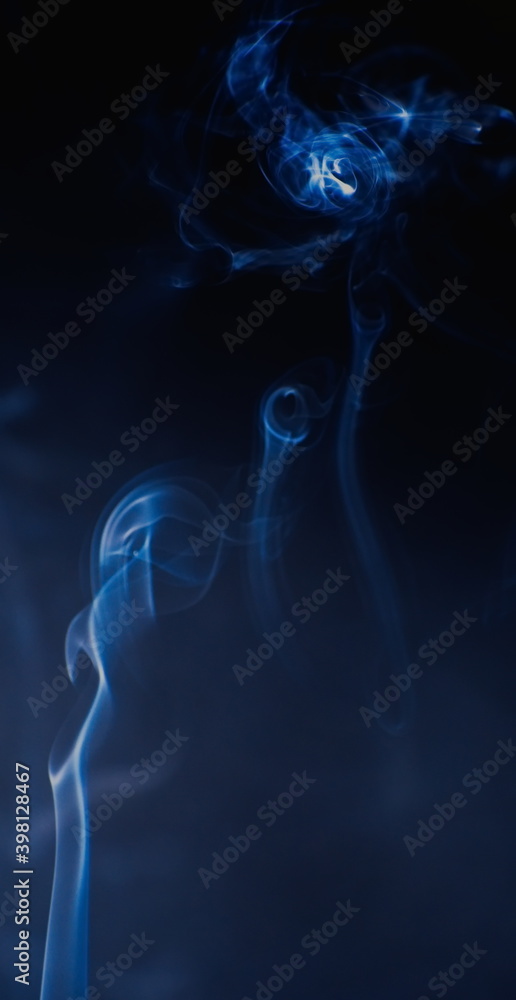 Abstract photographs of billowing smoke swirling and moving in the air. Abstract photographs of billowing smoke swirling and moving in the air.
