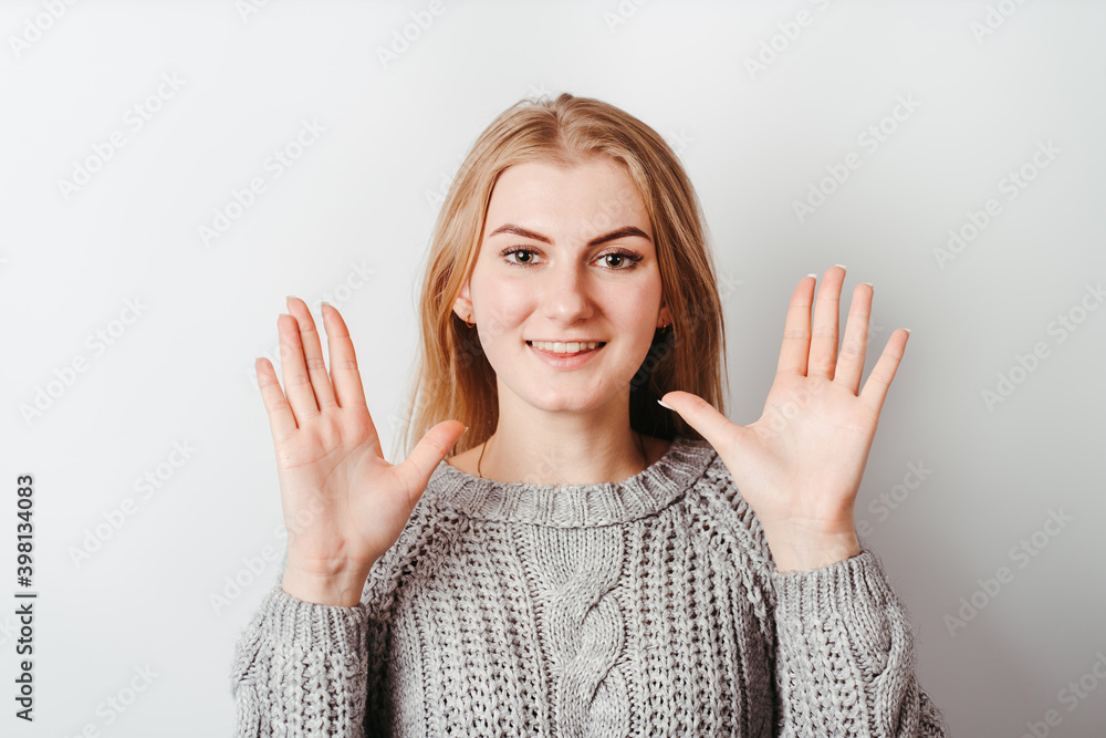 Confused shy clueless woman with open arms Confused shy clueless woman with open arms