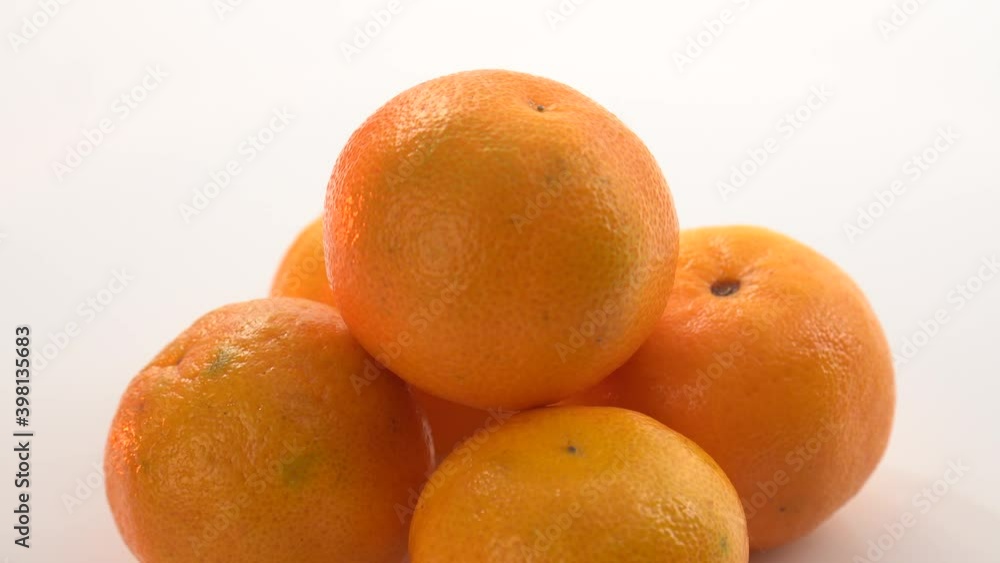 bright orange ripe tangerines rotate on their axis bright orange ripe tangerines rotate on their axis