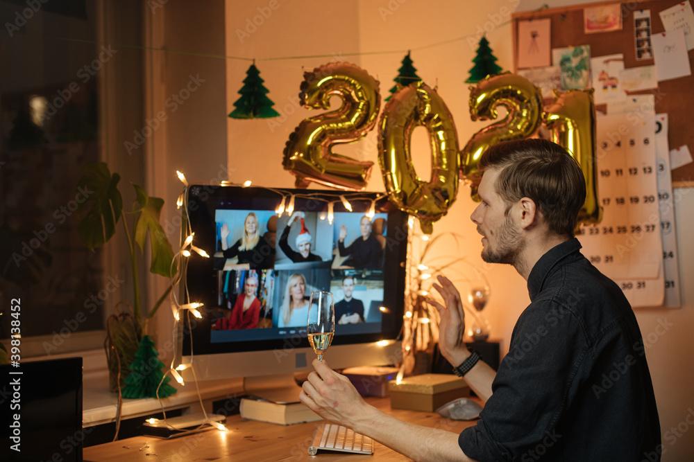 Office New Year conference party online meeting with friends and family. Christmas Holiday Eve in 2021. Parties during quarantine Distance Celebration. Video conferencing happy hour.