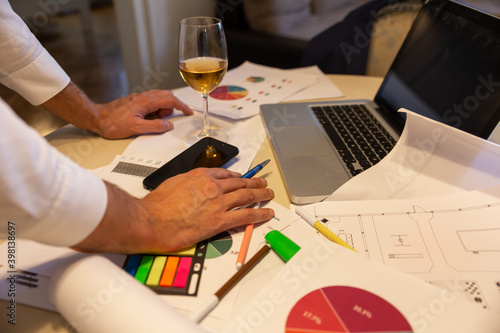 Wallpaper Mural Close up of male hands on desk working late from home. Torontodigital.ca