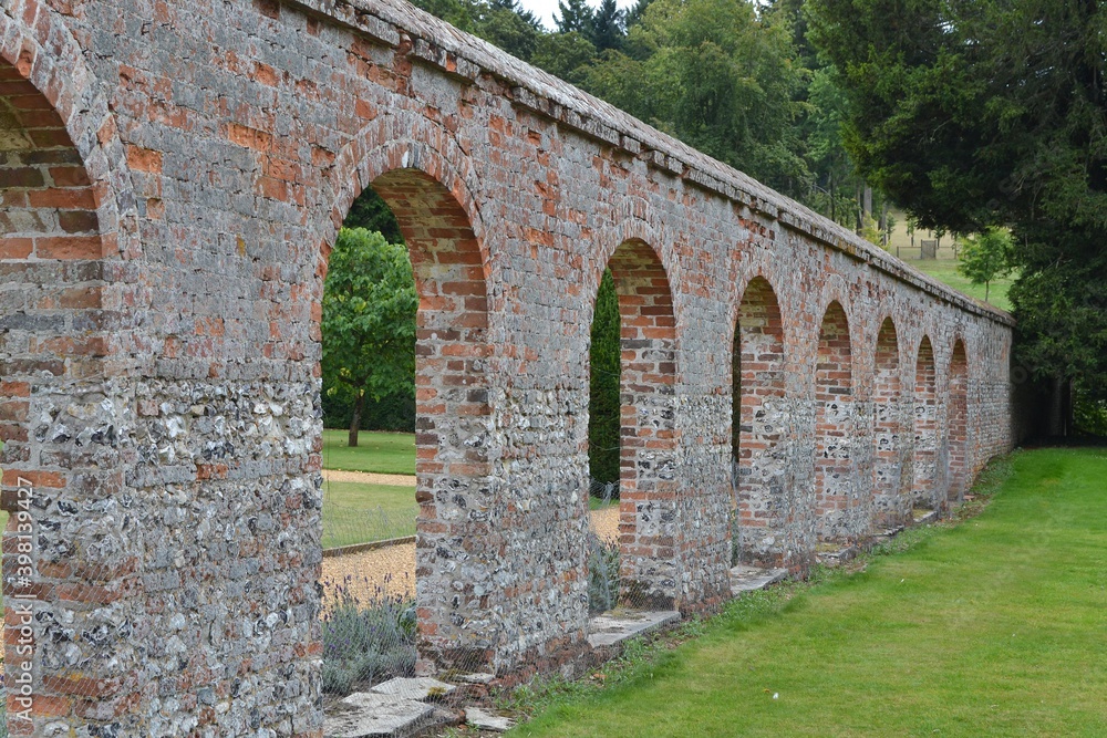 Rustic Arched Wall in English Countryside
