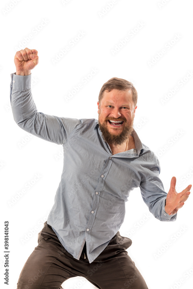 Joyful bearded man in shirt is happy to win Joyful bearded man in shirt is happy to win