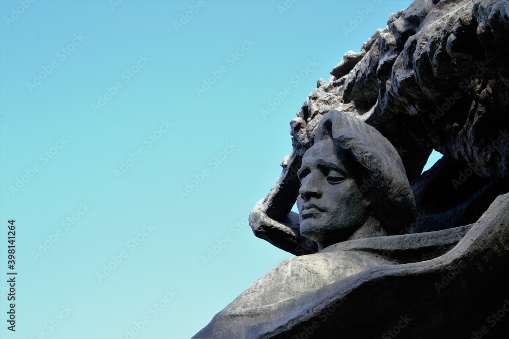 Fototapeta premium Warsaw, Poland. Frederic Chopin monument. Large, bronze statue of Frederic Chopin located in the upper part of Warsaw's Royal Baths. Autumn time