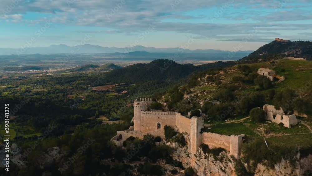 Aerial View of Santueri Castle, Felanitx, Mallorca, Touristic Ruins in the Mountain. Balearic Islands, Spain. Aerial View of Santueri Castle, Felanitx, Mallorca, Touristic Ruins in the Mountain. Balearic Islands, Spain.
