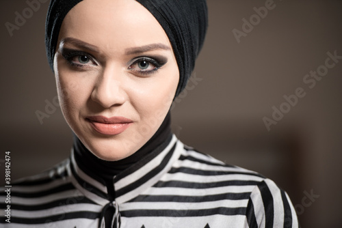 Muslim Woman Is Praying In The Mosque photo