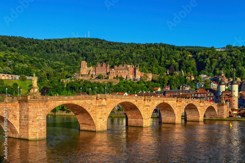 Karl Theodor bridge  river Neckar and castle in Heidelberg by day  Germany