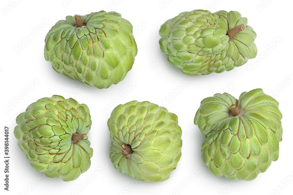 Fototapeta premium Sugar apple or custard apple isolated on white background with clipping path . Exotic annona or cherimoya fruit. Set or collection. Top view. Flat lay