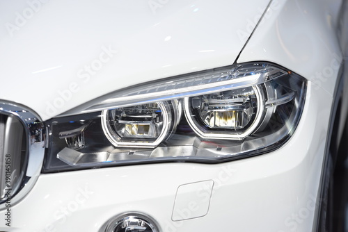 Beautiful parts of the new car. Car headlights, headlights, body lights, modern and sporty look  © tharathip
