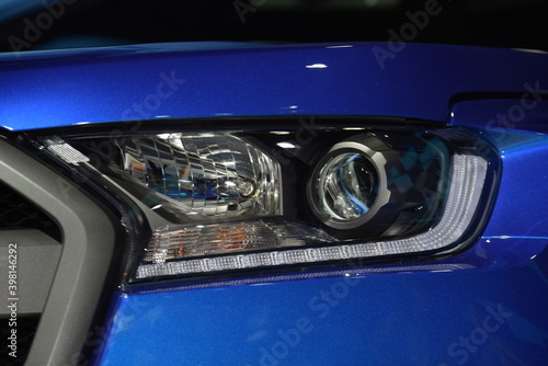 Beautiful parts of the new car. Car headlights, headlights, body lights, modern and sporty look  © tharathip