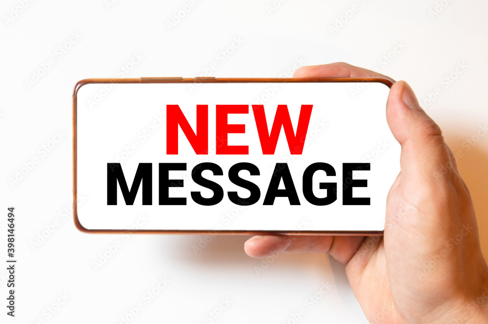 Hand holding mobile smart phone with one new message on a screen. Isolated on white. Hand holding mobile smart phone with one new message on a screen. Isolated on white.