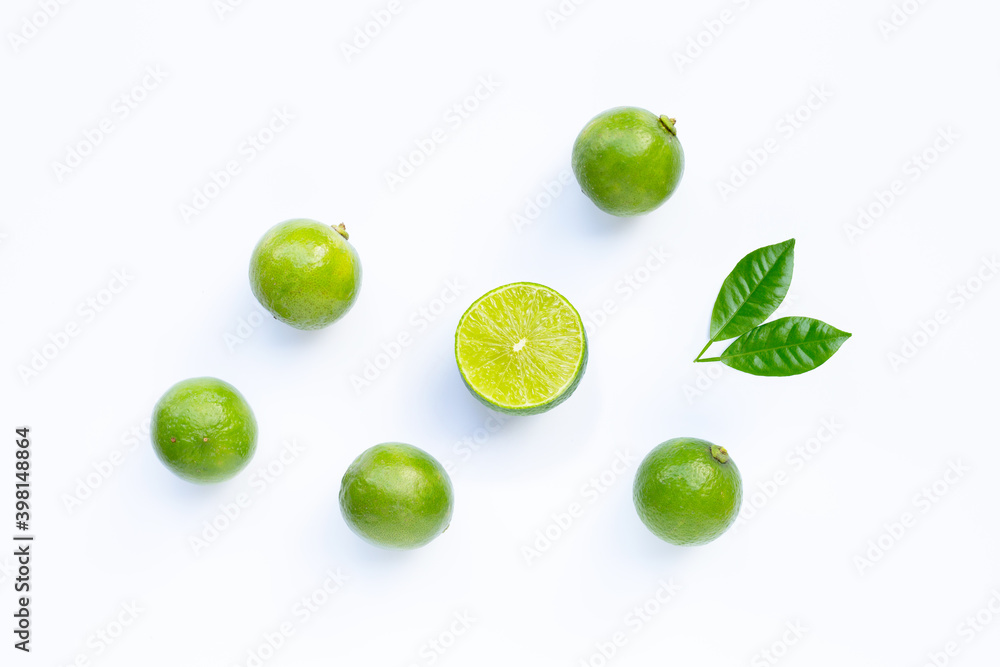 Limes with leaves isolated on white. Limes with leaves isolated on white.