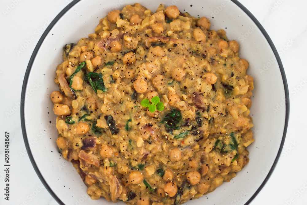 plant-based food, vegan chickpea potato and spinach curry