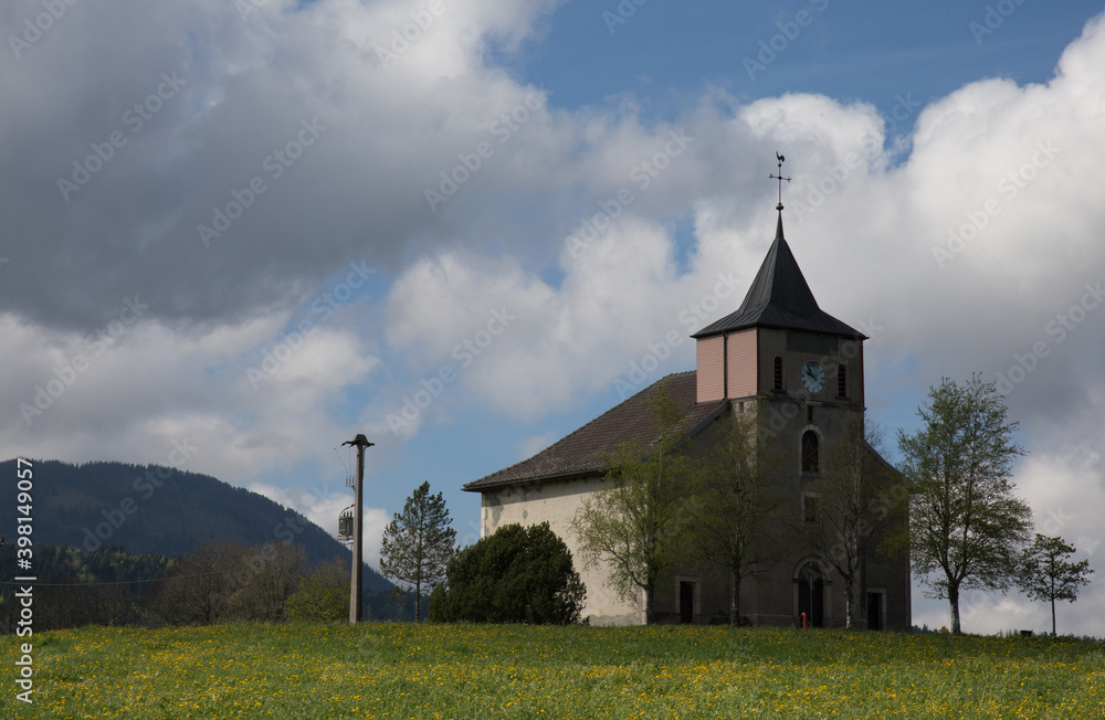 Church at the Top of a Field in a Small Village in Switzerland