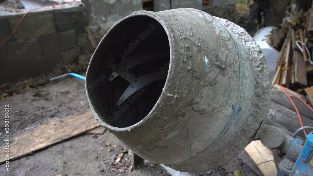 Small cement mixer mixing concrete Small cement mixer mixing concrete