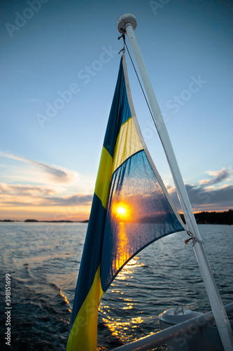 Canvas Print Swedish flag on boat in Stockholm archipelago