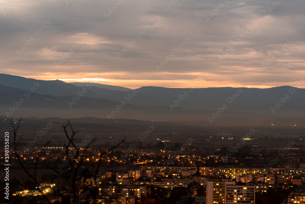 Obraz premium Sunset over polluted smog city environmental question conversation concept ecology nature Plovdiv, Bulgaria