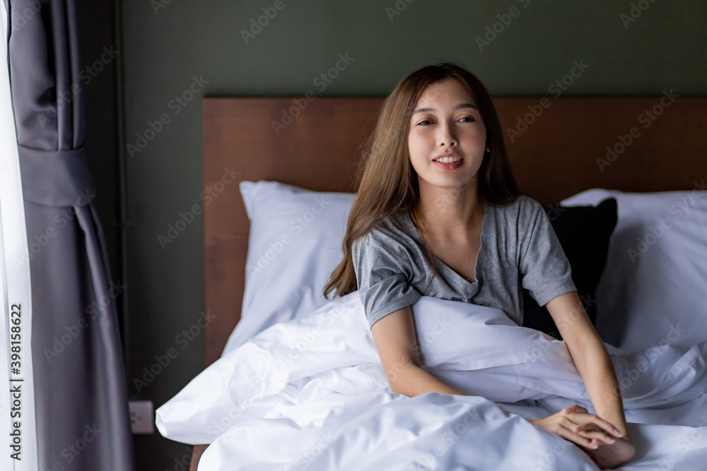 Beautiful women just wake up in the morning in the room. Beautiful women just wake up in the morning in the room.