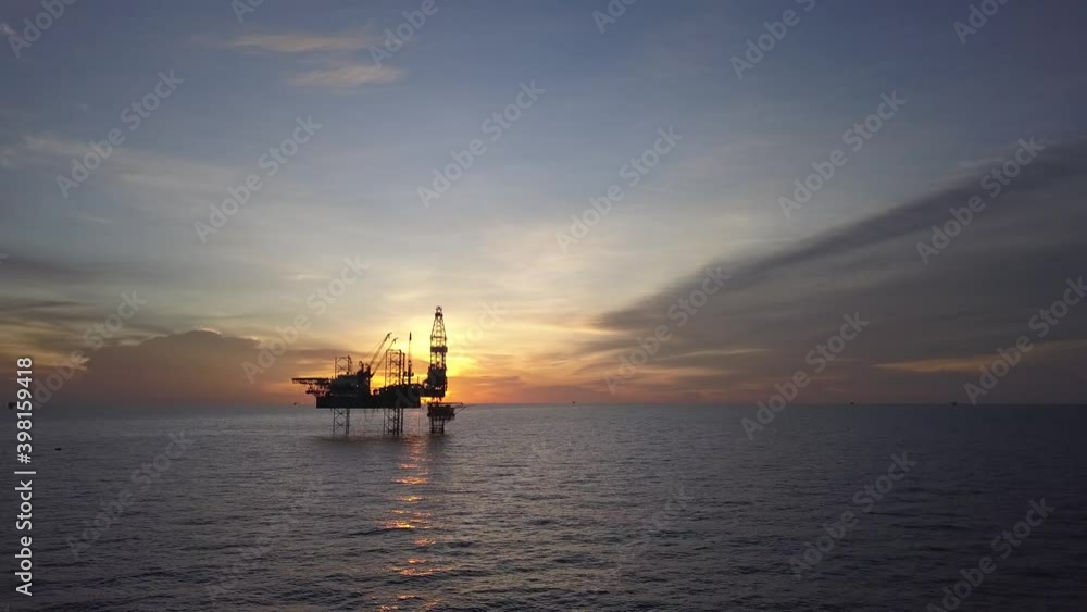 A drone shot of the offshore jack up rig in the middle of the ocean during run rise in the morning
A drone shot of the offshore jack up rig in the middle of the ocean during run rise in the morning