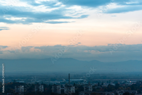 Sunset over polluted smog city environmental question conversation concept ecology nature Plovdiv, Bulgaria © Valentin