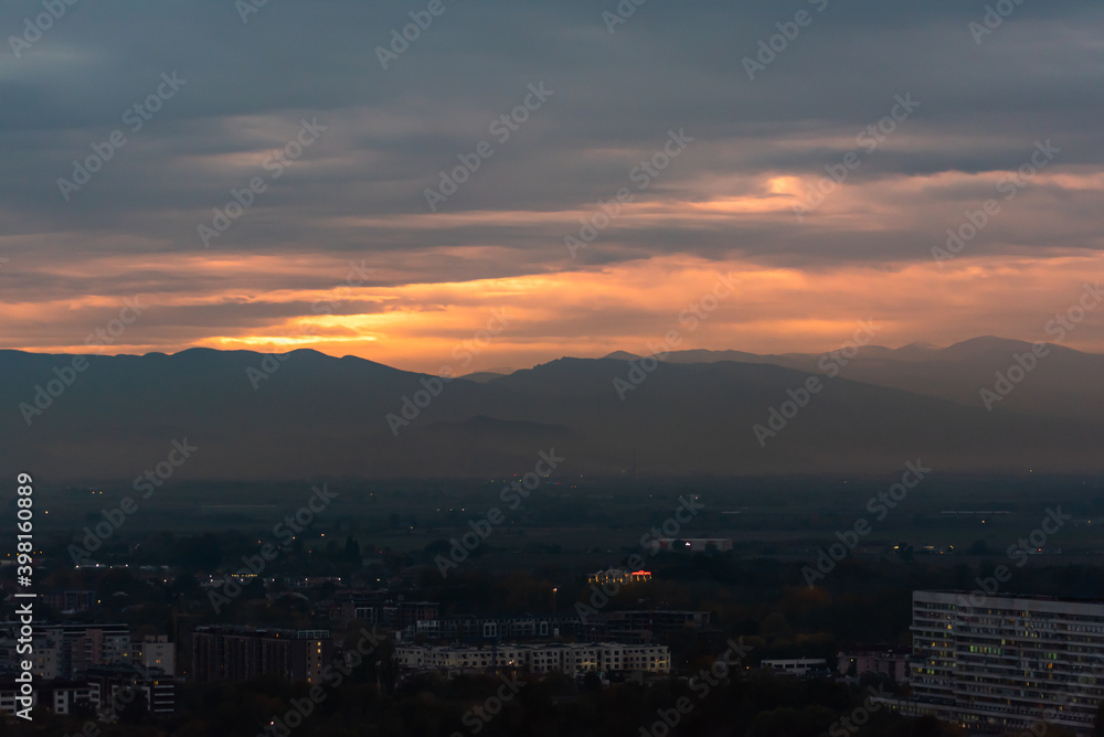Sunset over polluted smog city environmental question conversation concept ecology nature Plovdiv, Bulgaria