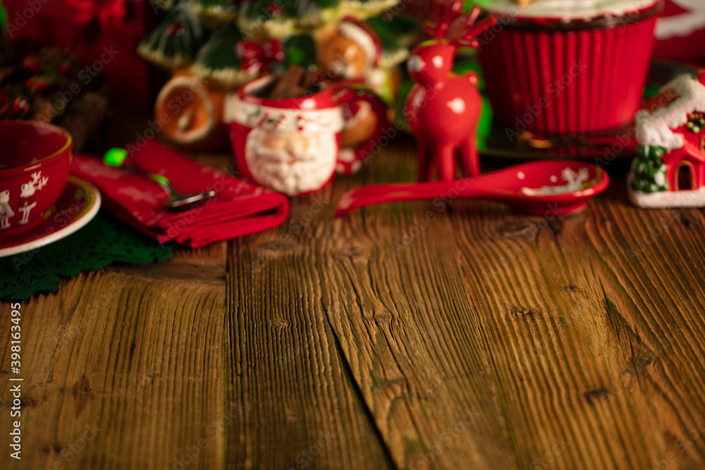 Christmas background. Christmas tableware and decorations on rustic wooden table. Christmas background. Christmas tableware and decorations on rustic wooden table.