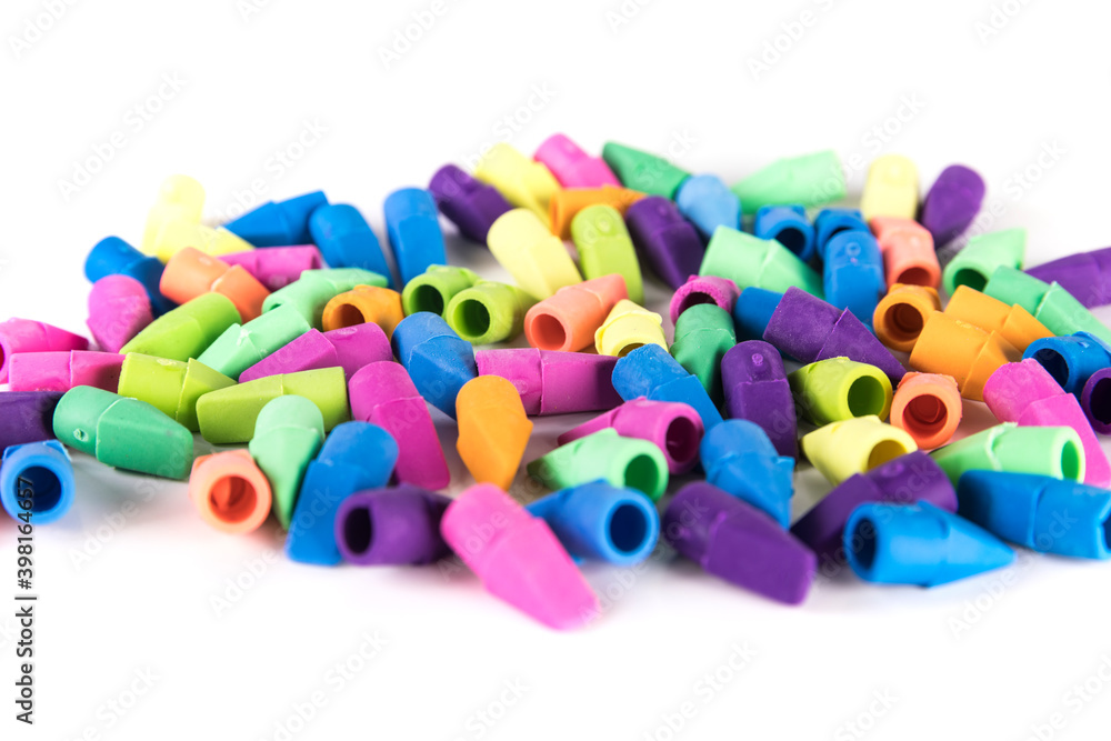 Pile of rubber pencil topper erasers vibrant and pastel colors yellow blue purple pink green Pile of rubber pencil topper erasers vibrant and pastel colors yellow blue purple pink green
