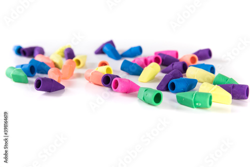 Scattered rubber pencil topper erasers in multiple colors
