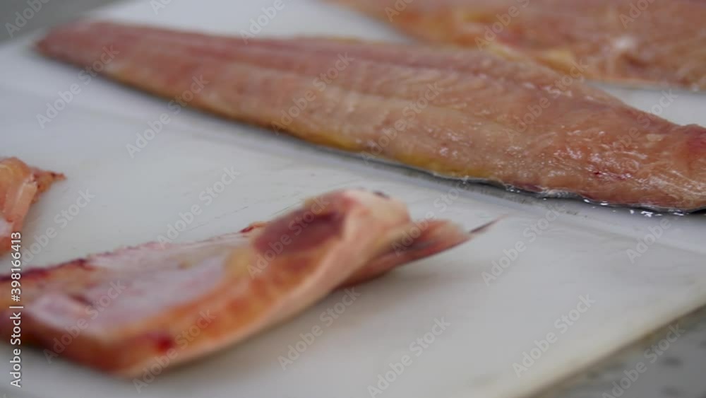 Slaughtering fish fillets. Separate parts before delivery. Slaughtering fish fillets. Separate parts before delivery.