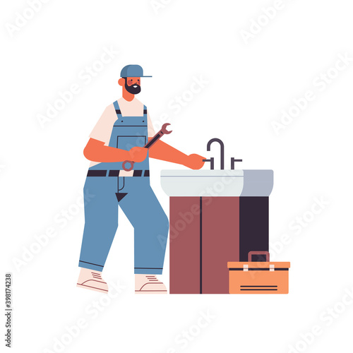 professional plumber in uniform using spanner repairing sink cleaning repair service concept full length isolated vector illustration