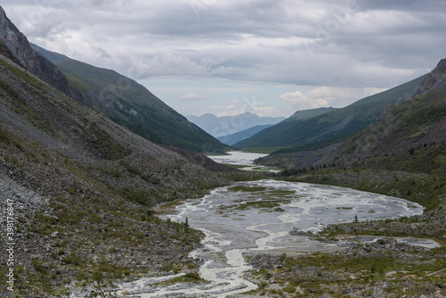 the alarmingly bubbling white mountain river of the Altai-Akkem © Павел Чигирь