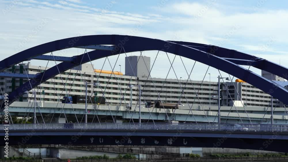 Traffic between bridges, condominiums and highways Traffic between bridges, condominiums and highways