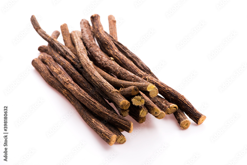Licorice roots on white background Licorice roots on white background