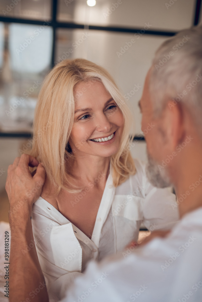Man and woman looking at each other and feeling romantic Man and woman looking at each other and feeling romantic