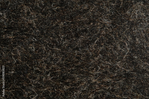 Dark brown natural paper fiber texture. Image photo surface background